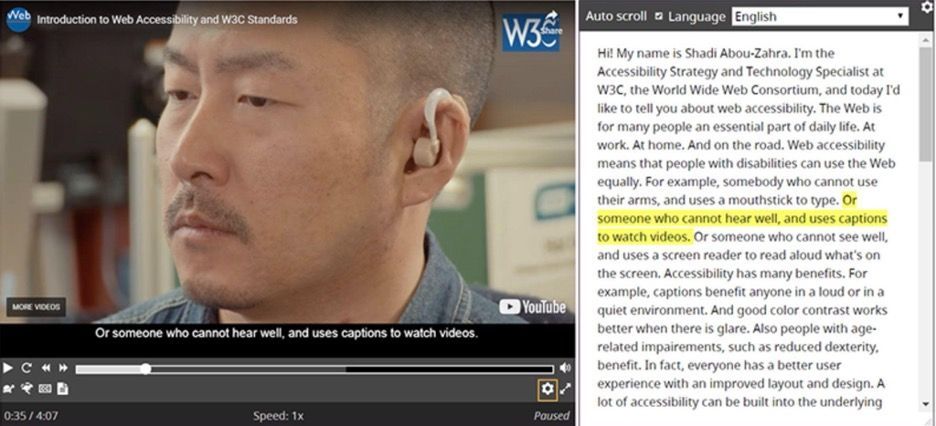 A video of a man wearing a hearing aid is being displayed on a computer screen.